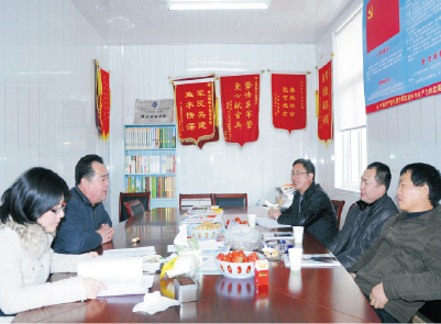 区教育局党委委员、副局长甘力平一行视察我校