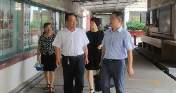 台州市教育局高处长、人事处陆老师和职成教处牟老师一行三人莅临我校